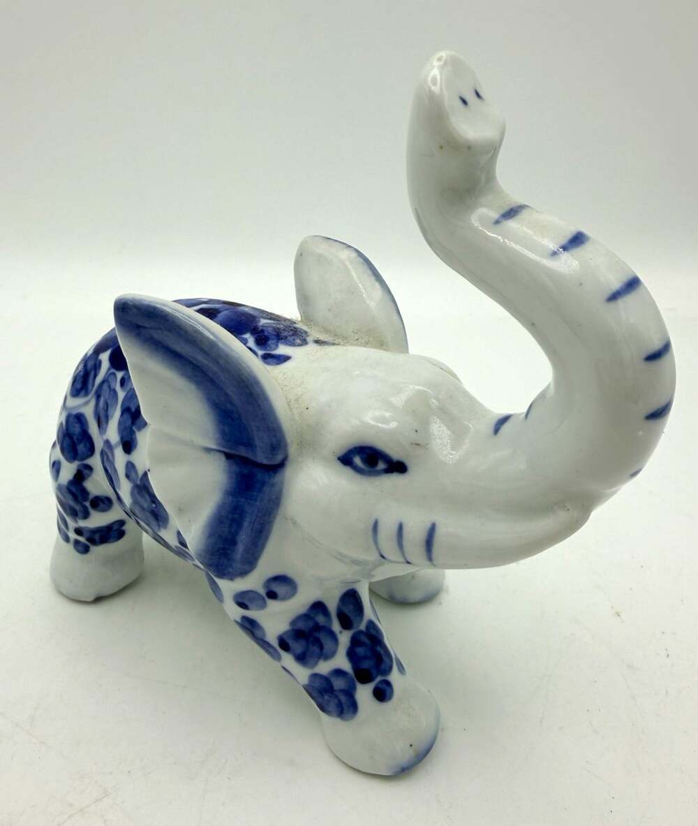 Blue & White Porcelain Elephant Figurine Trunk Up Raised Floral Pattern